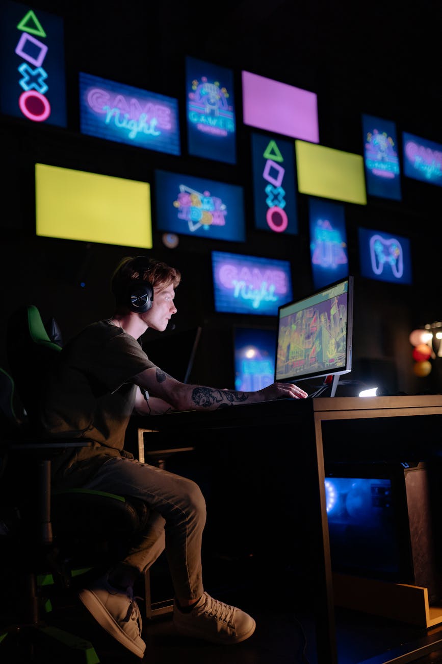 a man playing a video game in a computer